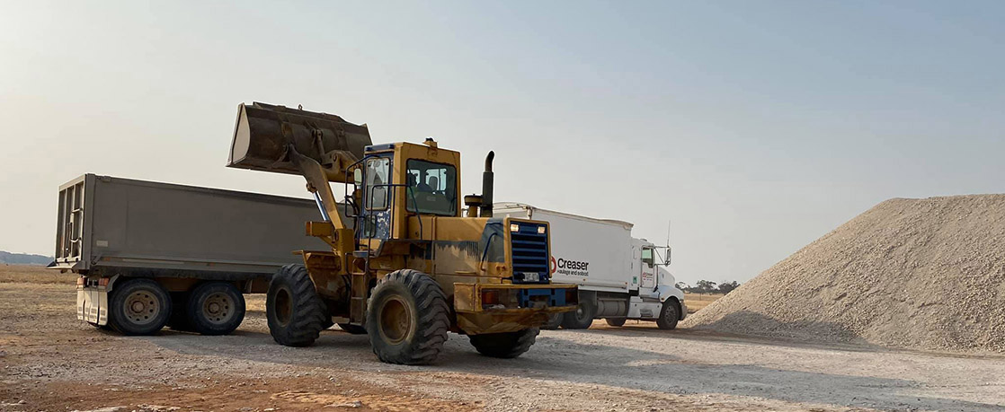 Creaser Haulage and Bobcat carts rubble and sand for your driveway or shed pad.